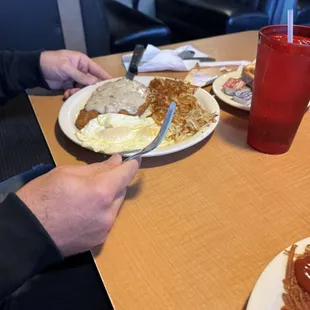 Chicken fried steak, eggs over easy, and an extra crispy hash brown