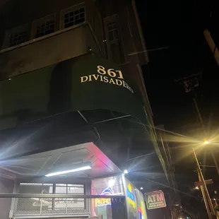 the outside of a store at night