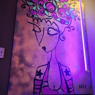 Quirky original artwork adorns the walls.