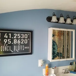 a bathroom with blue walls