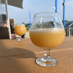 Mr. Balloon Hands, a hazy American IPA, enjoyed outside on the patio.
