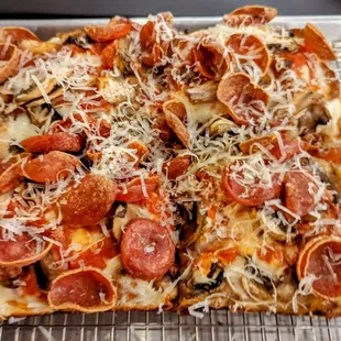 A build-your-own pepperoni and mushroom Detroit-style pizza (small)