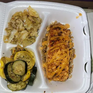 Salmon over rice, with cabbage, squash and zucchini