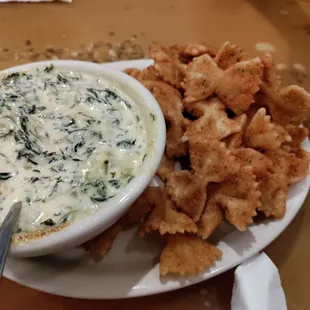 Spinach and artichoke dip with fried bowtie pasta