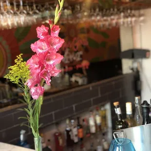 Flowers in entrance on the bar