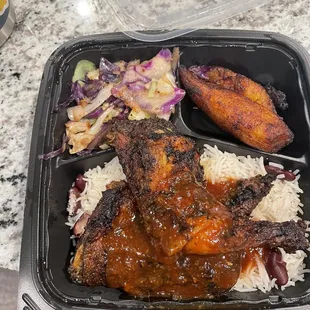Jerk chicken plate w/ plantains and cabbage