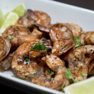a plate of grilled shrimp