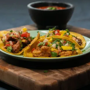 a plate of food on a cutting board