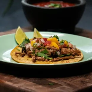 a plate of food on a cutting board