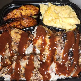 Jerk chicken plate with plantains and mac and chz