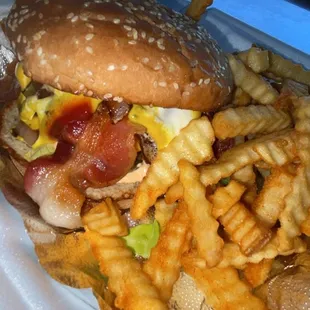 Juicy meaty bacon and egg cheese burger