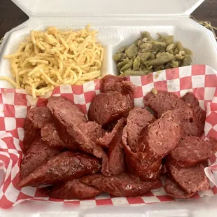 a tray of meat and cheese
