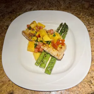 Red Snapper with mango salsa and asparagus.