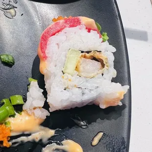 Warrior roll with tiny tempura shrimp Inside and paper thing tuna on top