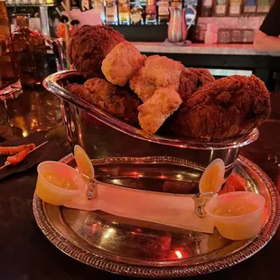 Whole fried chicken. Served in a tub for funsies