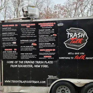 a food truck parked on the side of the road