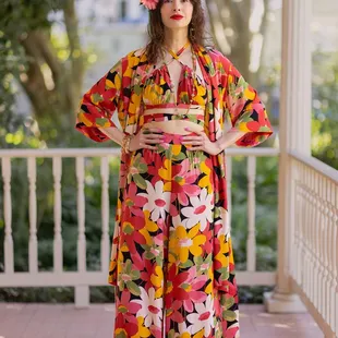 Based on an original 1930s print, the Flower Power collection is not for the wall flower with styles spanning many decades. Good vibes only!