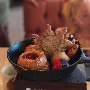 Assorted pastries served up in a frying pan as a nod to Rapunzel.