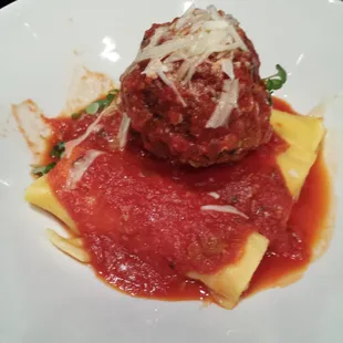 The Polpetta Gigante... Three pieces of cannelloni filled with ricotta, topped by a 7oz. meatball and seasoned with oregano.