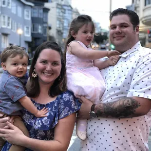 Gina and Kevin Correnti, third generation Correnti owners, with fourth generation in arms!