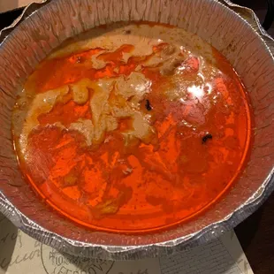 Liquid on bottom of the pan from the wings.