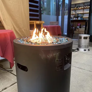 Romantic outdoor seating quite toasty.