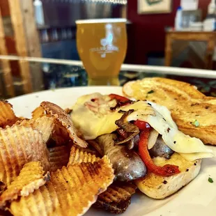 Italian sausage, red pepper, and onion sandwich for lunch at TLC.