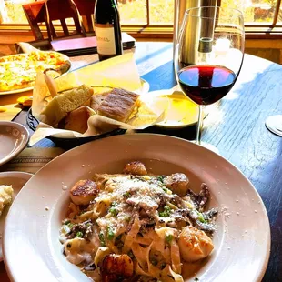 We split a Fettuccini Alfredo with Prosciutto, Mushrooms &amp; Scallops ($28).  Delicious!