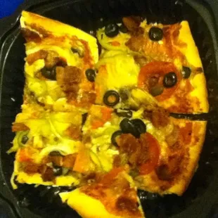 Pizza w/ sausage, pepperoni, black olives, mushrooms, peppers, &amp; onions. X-tra toppings Easy sauce and cheese