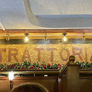 a sign that reads trattora