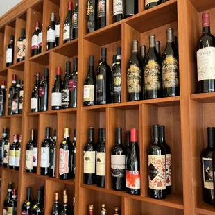 a wall of wine bottles