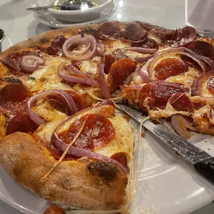 Pepperoni and onion pizza