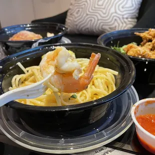 To go: Shrimp Scampi, Calamari Golden, Garlic Rolls.
