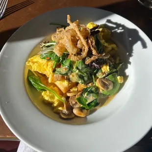 Polenta and Avocado with spinach, mushrooms, red pepper hollandaise and crispy onions! BEST PLACE EVER!