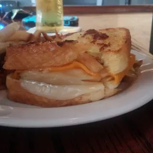 Amazing bacon, perogi, cheese sandwich! Must have!