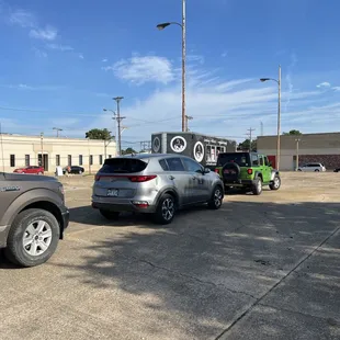 two cars parked in a parking lot