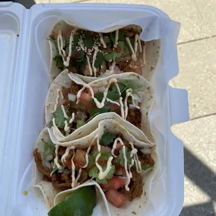 Beef Bulgogi, and roast pork tacos with kimchi fried rice