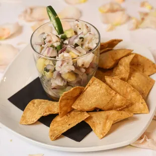 a plate of chips and salsa
