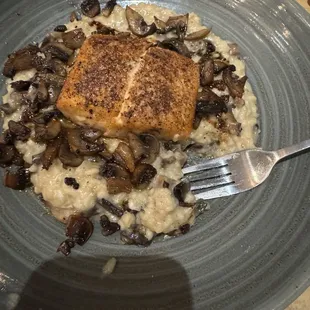 Salmon over mushroom risotto