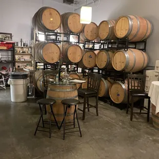 barrels and tables in a wine cellar