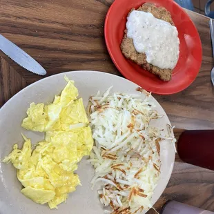 Chicken Fried Steak, scrambled eggs and hash browns