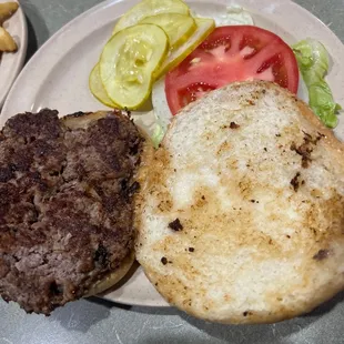 a burger and fries on a plate