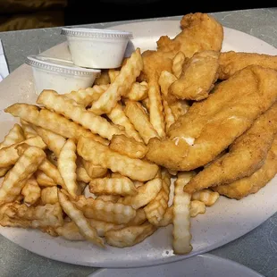 a plate of fried fish and fries