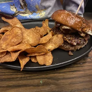 a plate of chips and a sandwich