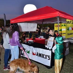 a group of people and a dog