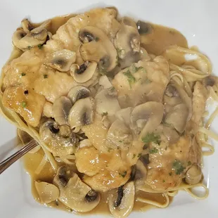Chicken Marsala over linguini