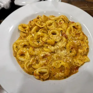 Tortellini Tre Salsa - Cheese tortellini sauteed in our unique blend: Marinara, alfredo, and pesto sauce