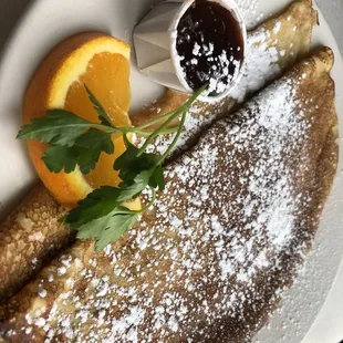 Swedish pancakes with lingonberry butter. Very good. A good value at $7.50.