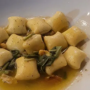 lemon pillow gnocchi pillow shaped gnocchi stuffed w Grana Padano cheese&amp;black truffle in a lemon butter&amp;sage sauce w chopped walnuts
