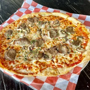 Meatball and wild mushroom pizza